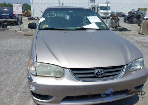 2002 Toyota Corolla Le z USA, uszkodzony, nr VIN 2T1BR12EX2C577933